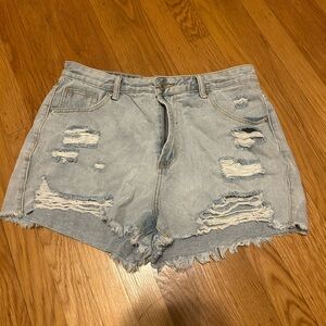 large light wash ripped jean shorts